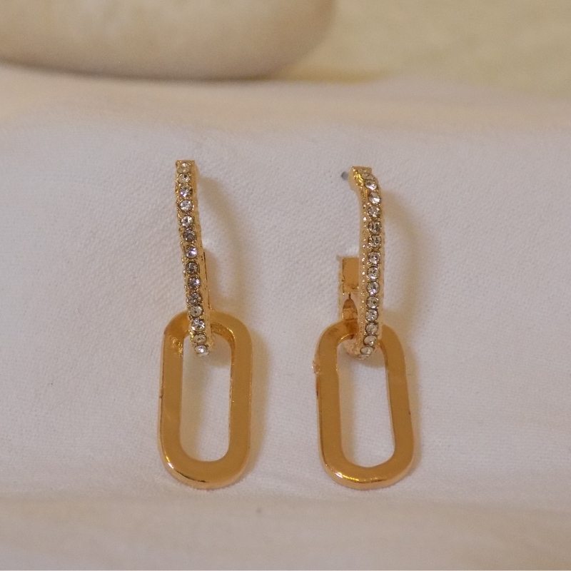Half gold half diamante earrings